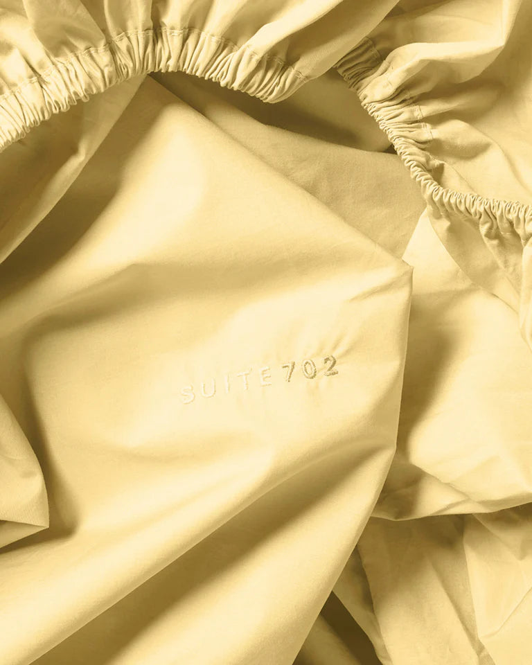 Pudebetræk Butter Yellow detalje — SUITE702