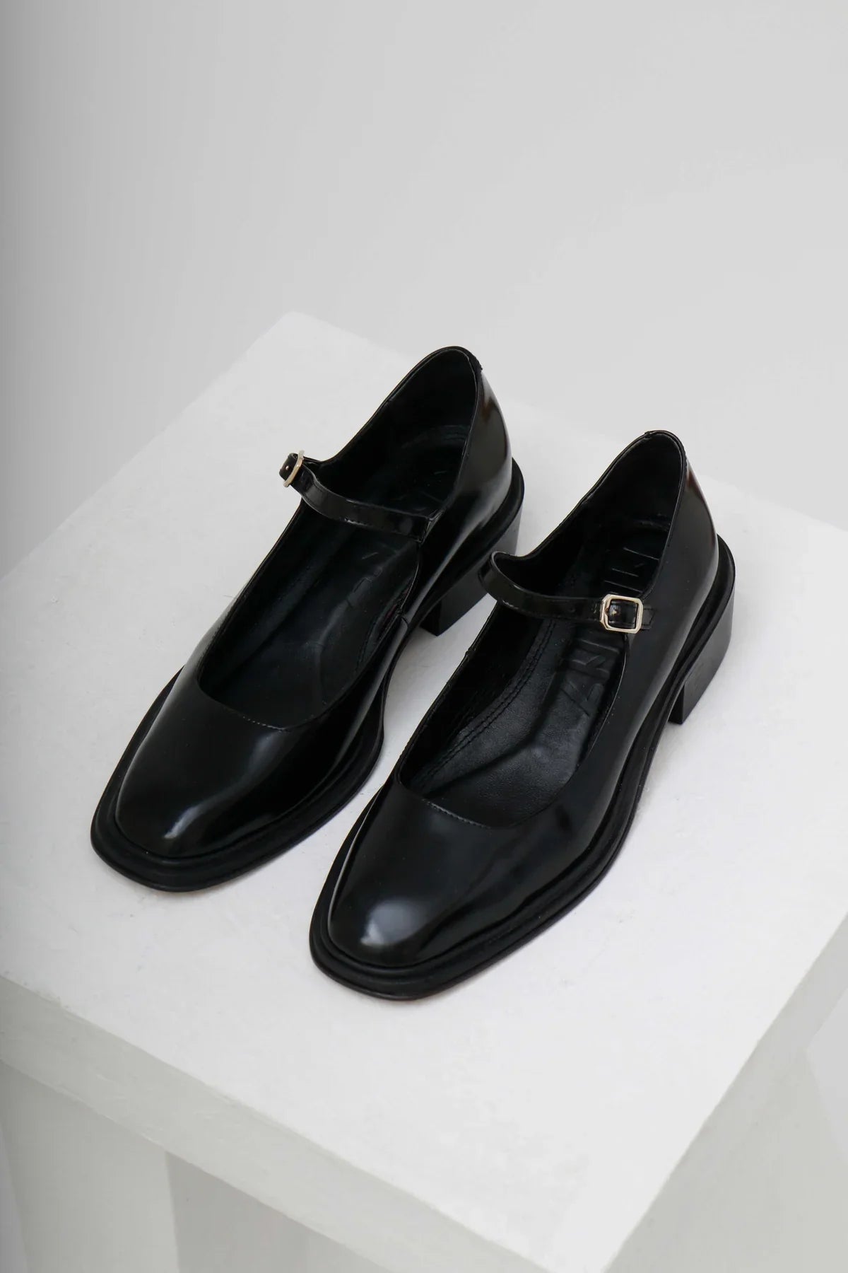 Penelope, Black Polished Leather Babies